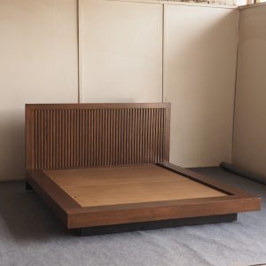 Floating bed frame with fluted headboard