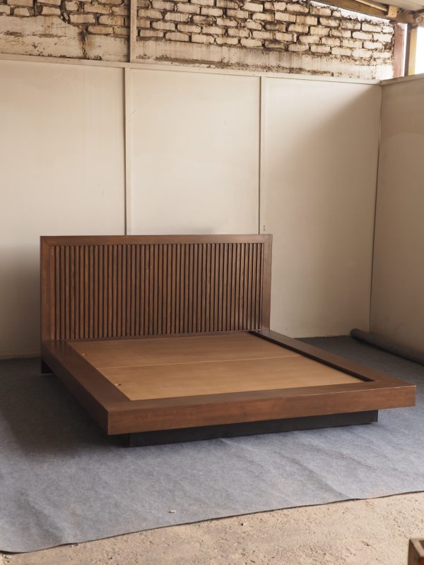 Floating bed frame with fluted headboard