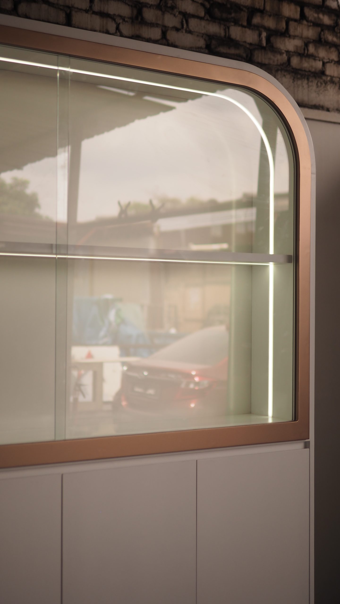 Display Cabinet with Curved Top & Concealed Storage - Image 3